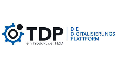 Flagship-Produkt der HZD: die Technische Digitalisierungsplattform TDP Logo der Technischen Digitalisierungsplattform TDP, das aus dem Schriftzug mit dem Produktnamen und einem zahnradähnlichen Icon zusammensetzt
